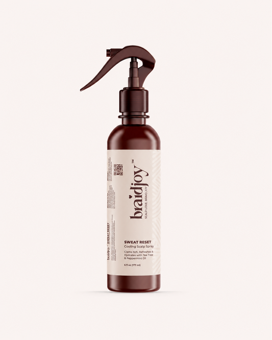 Amber braidjoy Sweat Reset cooling scalp spray on a light background, designed to soothe itch, refresh and balance the scalp, detox sweat and synthetic hair buildup, and support healthy hair growth during braids.