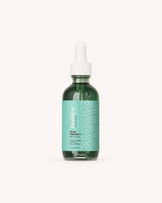 Green glass braidjoy Edge Protect edge therapy serum with a teal label and white dropper, designed to protect fragile edges, soothe irritation, reduce breakage from tight styles, and support stronger, healthier hair growth without buildup.